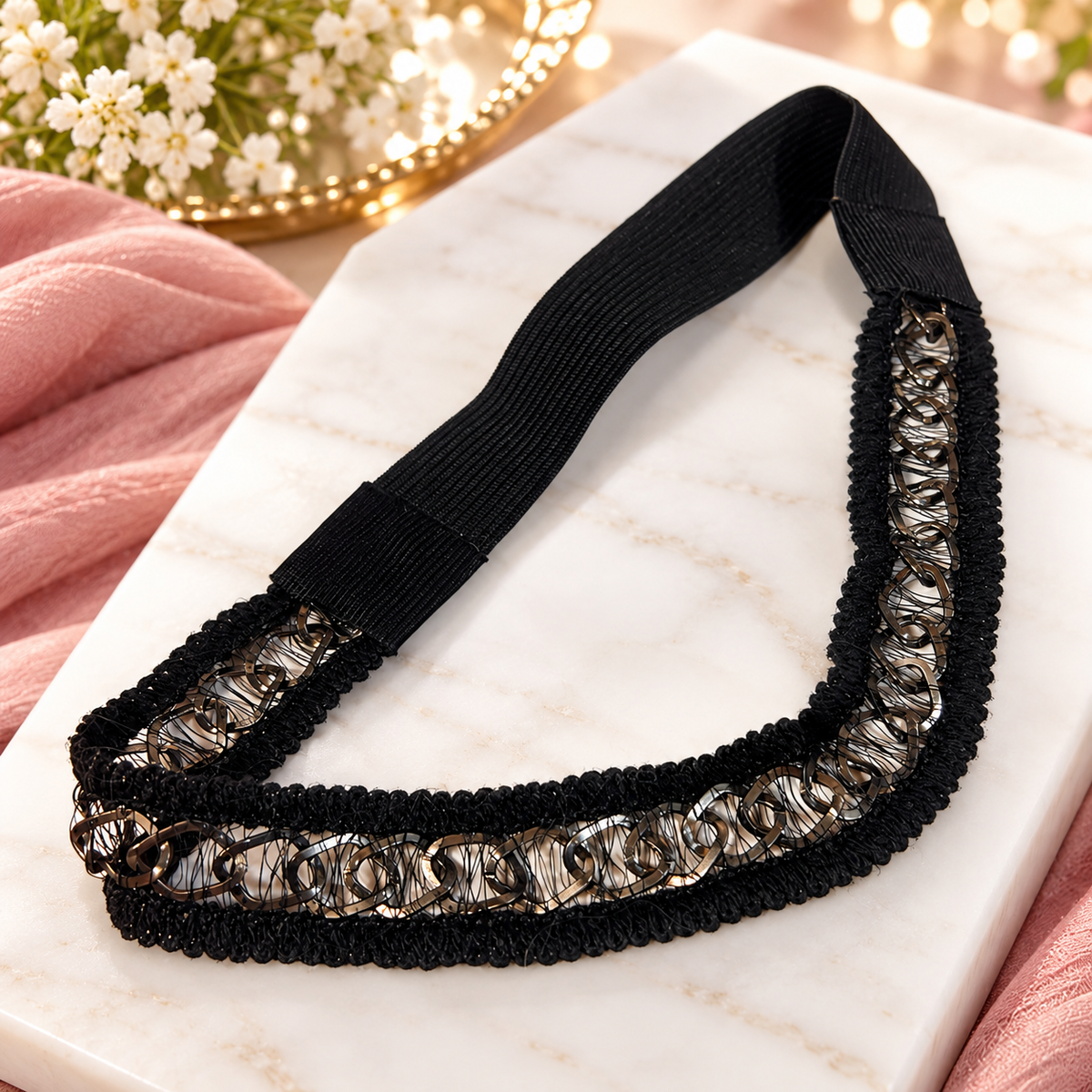 Black Paparazzi One & Done headband with woven gunmetal link chain and black elastic band