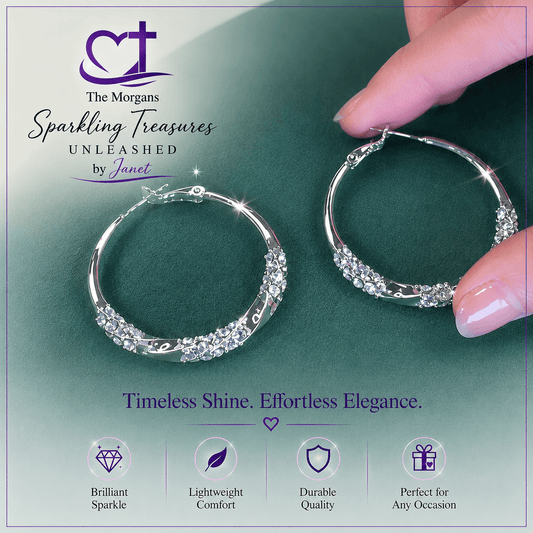 Silver hoop earrings on a green surface with 'The Morgans' branding.
