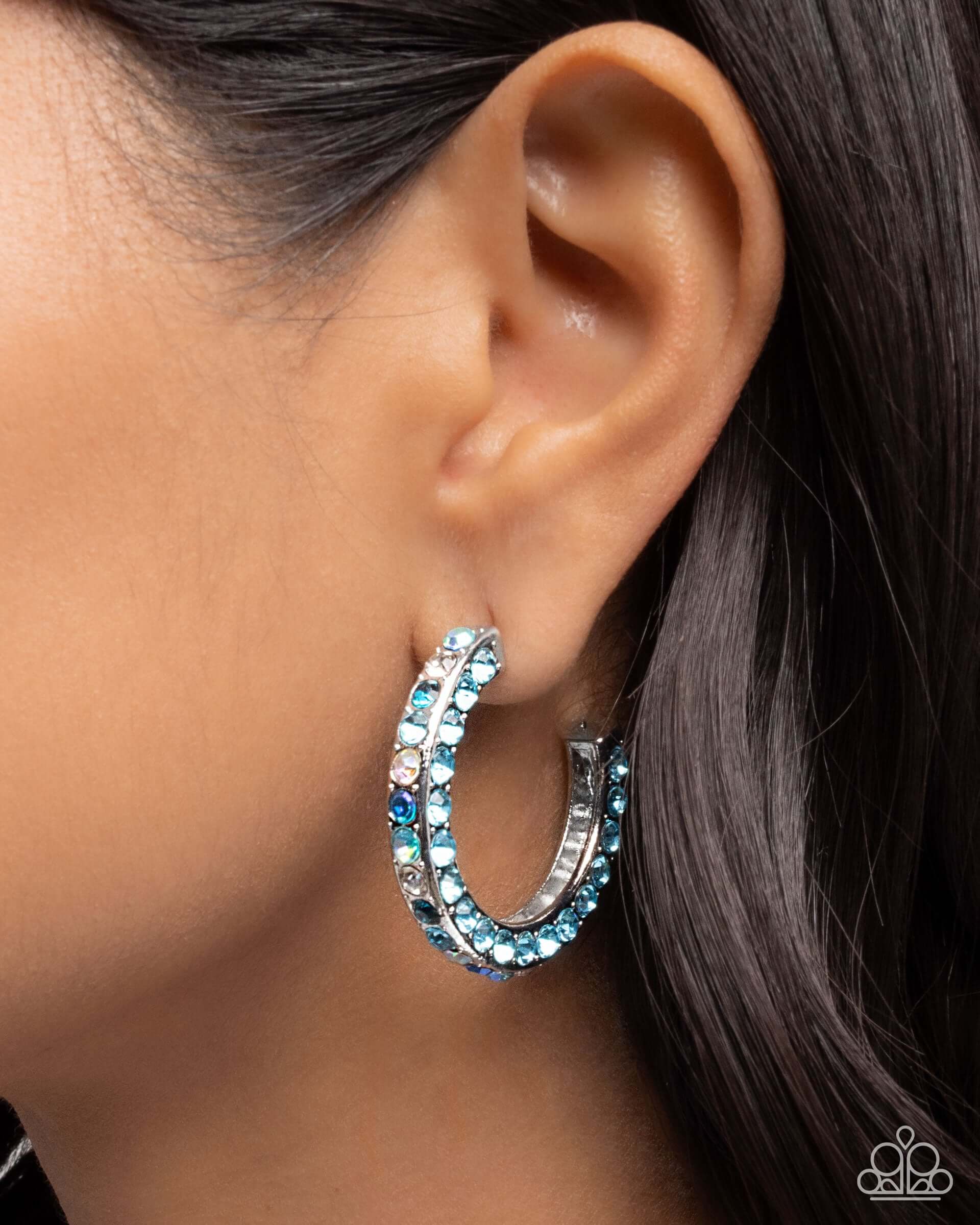 High-Level Haute - Blue Paparazzi Hoop Earrings worn, showcasing blue rhinestones and silver hoops.