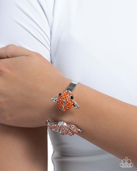Swimming Serenity - Orange Paparazzi Fish Cuff Bracelet Accessories,Animal Lovers,Animal Print,Black,Bracelet,Coral,Cuff,Iridescence,Orange,Peach,Sea Breeze Style,Silver Accents,Starfish,Yellow