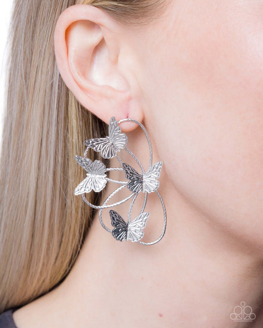 Aerial Apparel - Silver Paparazzi Butterfly Post Earrings showcased on model's ear.