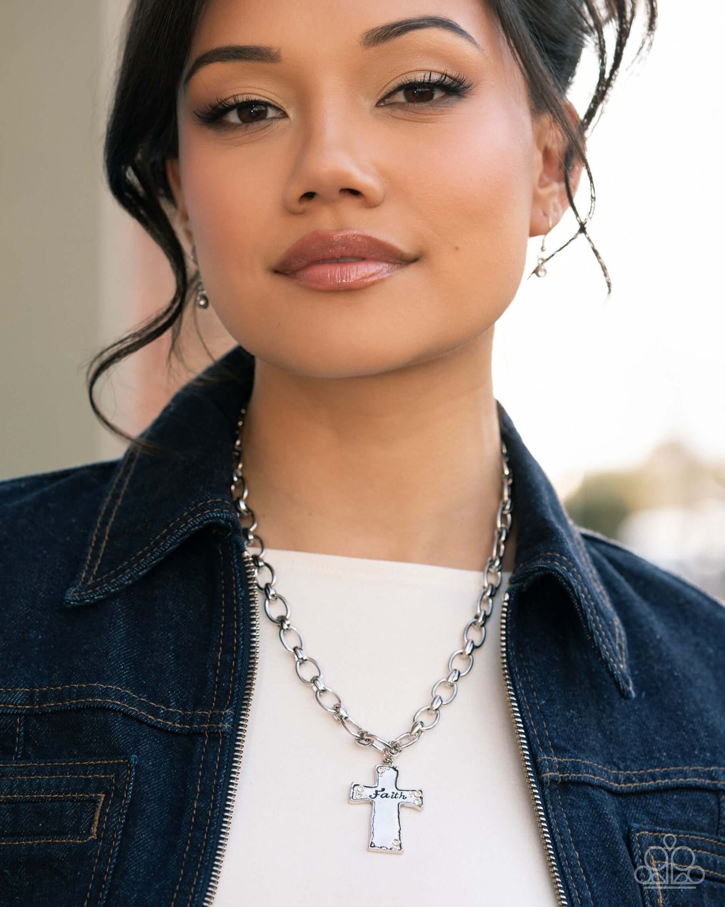 Faithful Flair - White Paparazzi Cross Necklace worn by a model, featuring silver chain and cross pendant.