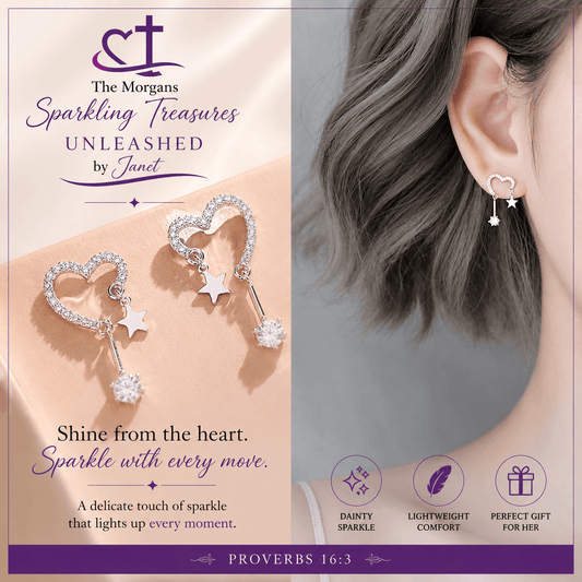 Heart-shaped earrings with stars worn by a person, branded 'The Morgans Sparkling Treasures UNLEASHED by Janet'.