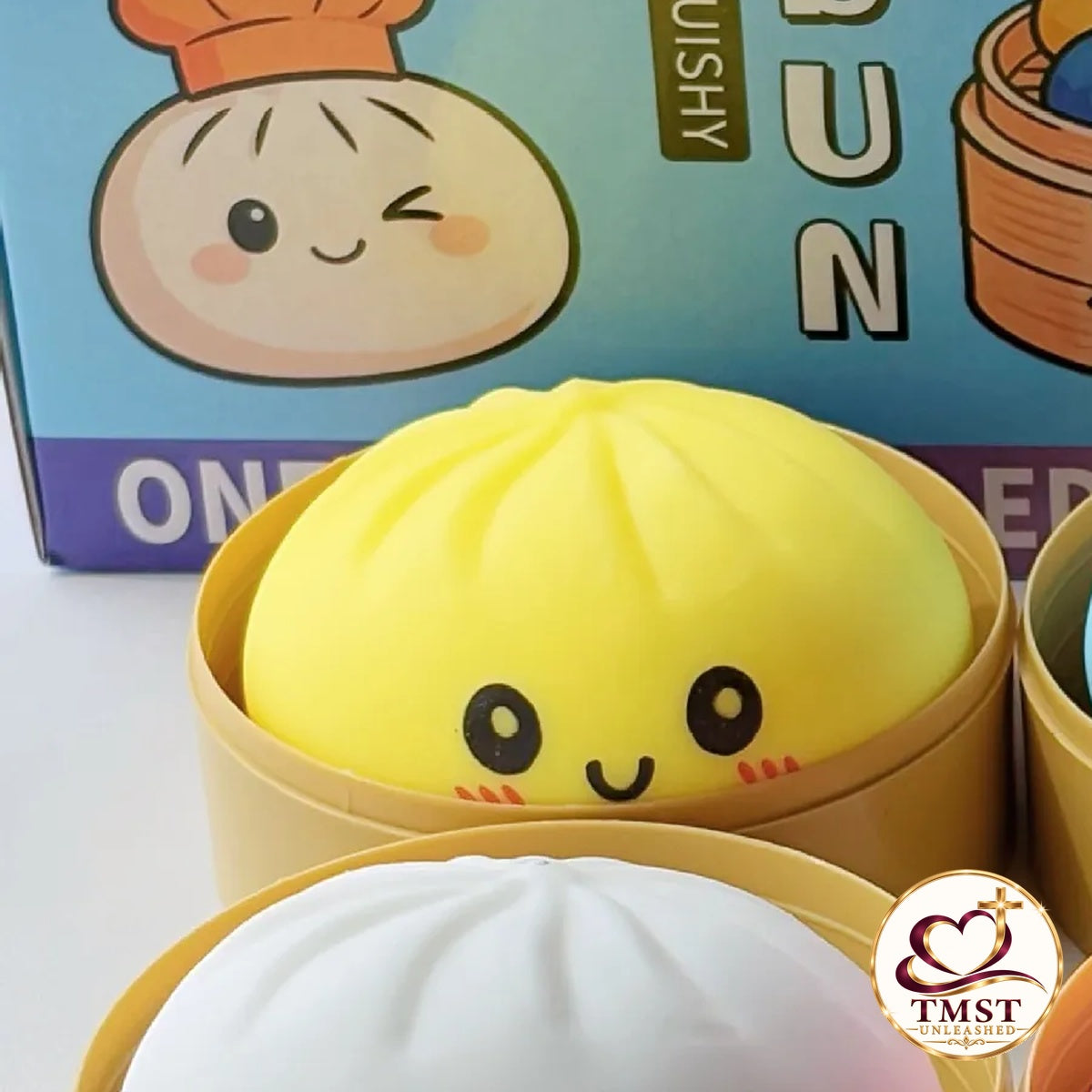 Squeeze & Smile™ Yellow Bun Squishy product photo