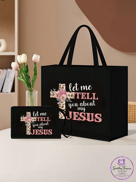 A black tote bag and matching small pouch set with a floral cross graphic and the text 'let me TELL you about my JESUS' on a tabletop. Pink tulips in a vase and a neutral indoor background are visible beside the items.