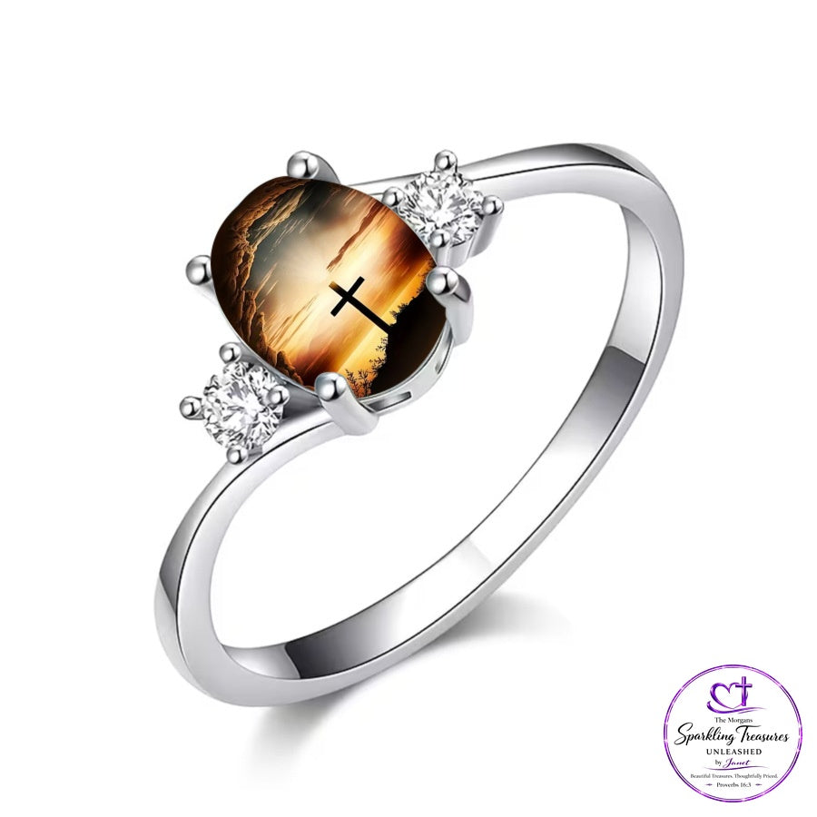 Light of Calvary™ faith inspired silver tone ring with amber-look center and cross motif.